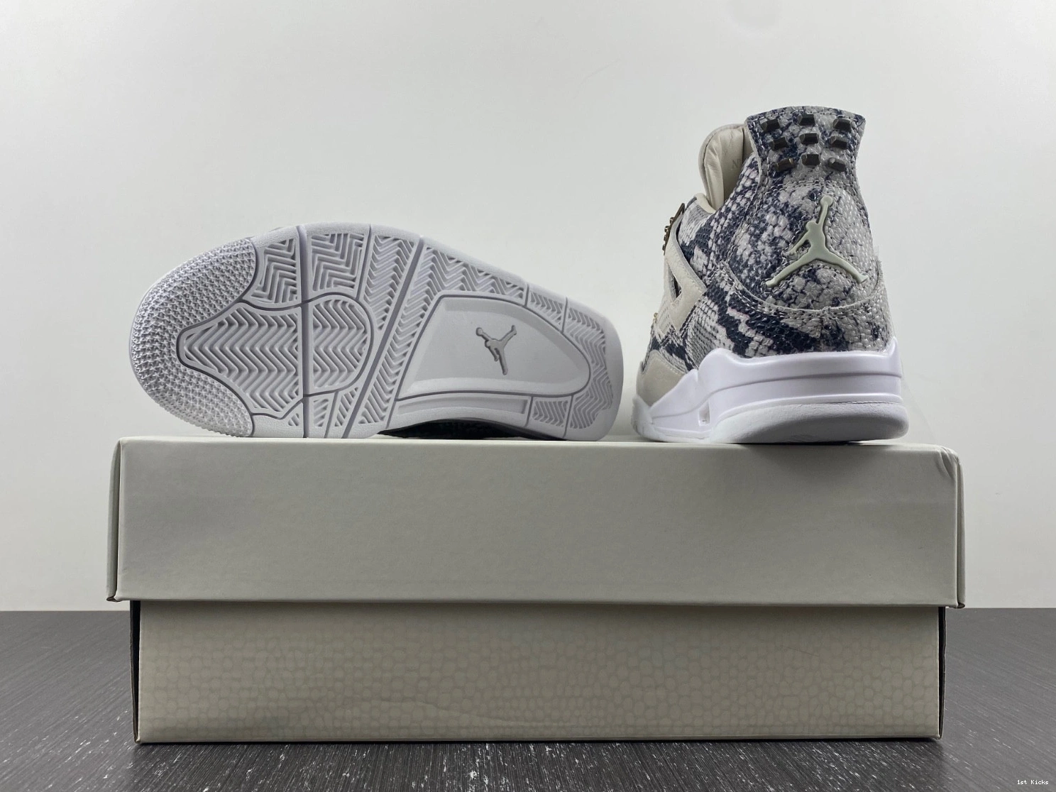 - 819139-030 Retro Snakeskin Jordan 4 1225